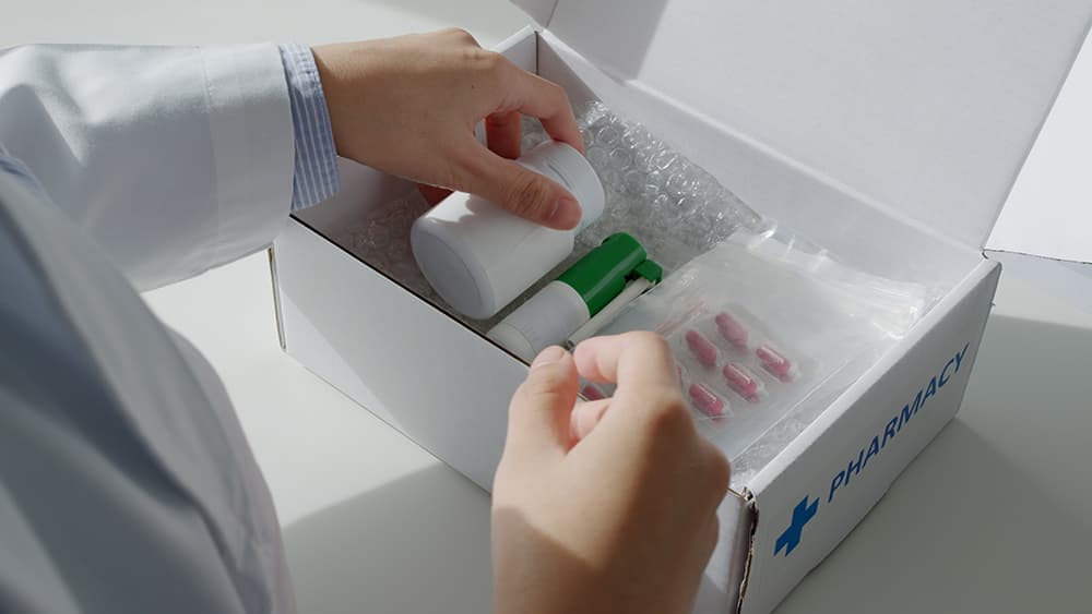Online pharmacy man looking a prescription